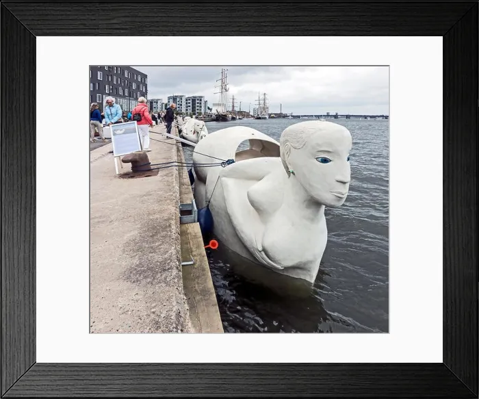 Framed Print : Mobile sculptures made of concrete called Life-Boats by Norwegian Marit Benthe Norheim moored in the Harbour Aalborg Framed Print : Mobile sculptures made of concrete called Life-Boats by Norwegian Marit Benthe Norheim moored in the Harbour Aalborg