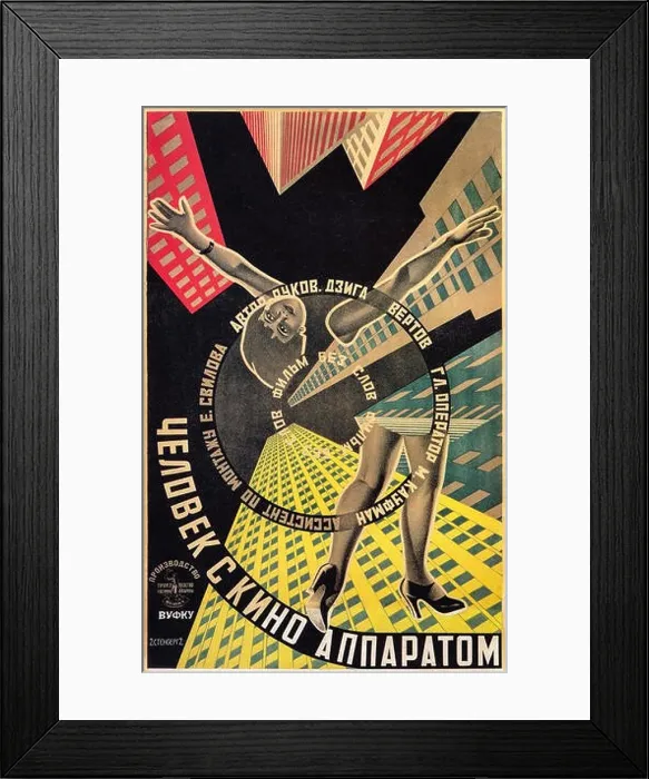 Framed Print : Man with a Movie Camera poster for silent documentary film by director Dziga Vertov Framed Print : Man with a Movie Camera poster for silent documentary film by director Dziga Vertov