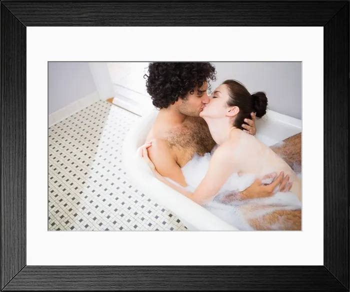Framed Print : Couple kissing in the bath Framed Print : Couple kissing in the bath