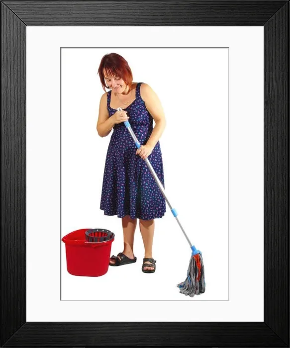 Framed Print : Housekeeper cleans the floor. Woman washes the floor with mop. On a white background, isolated Framed Print : Housekeeper cleans the floor. Woman washes the floor with mop. On a white background, isolated