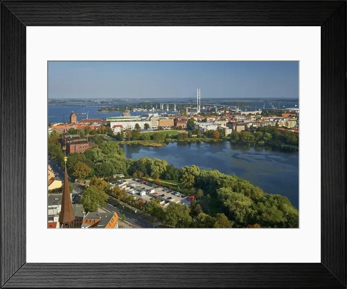 Framed Print : View from St. Mary's Church to the Rügen Bridge and the island of Dänholm in the Strelasund Framed Print : View from St. Mary's Church to the Rügen Bridge and the island of Dänholm in the Strelasund