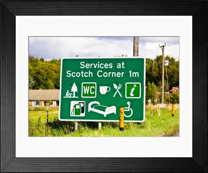 Framed Print : Sign showing distance to Scotch Corner services on the A1 with facilities, England, UK Framed Print : Sign showing distance to Scotch Corner services on the A1 with facilities, England, UK