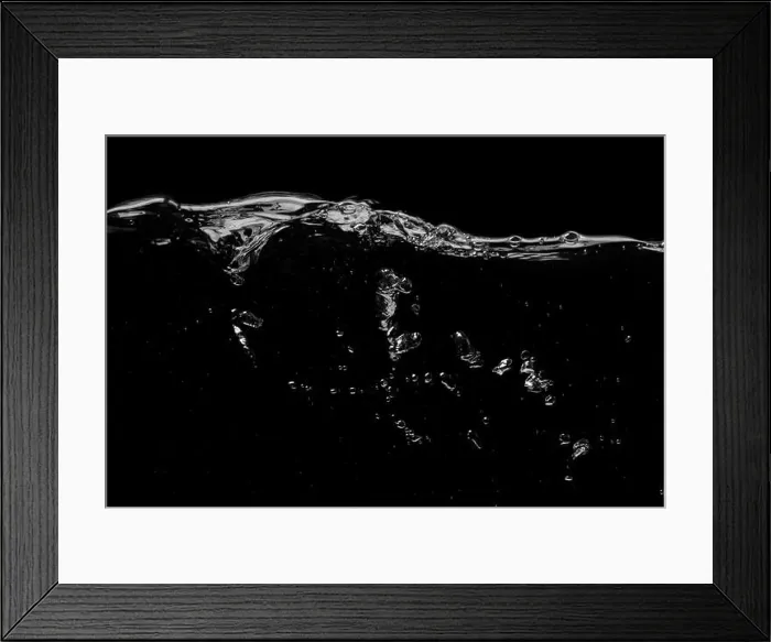Framed Print : Clear water surface on a black with ripple and bubbles Framed Print : Clear water surface on a black with ripple and bubbles