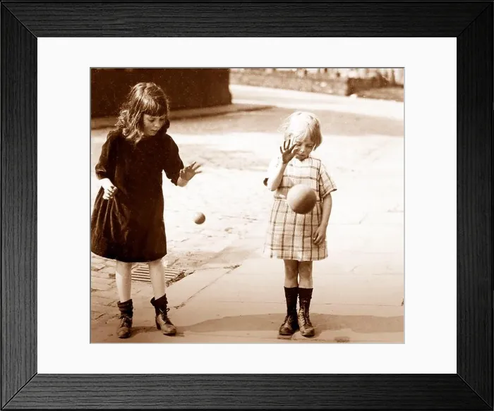 Framed Print : Children bouncing balls, early 1900s Framed Print : Children bouncing balls, early 1900s