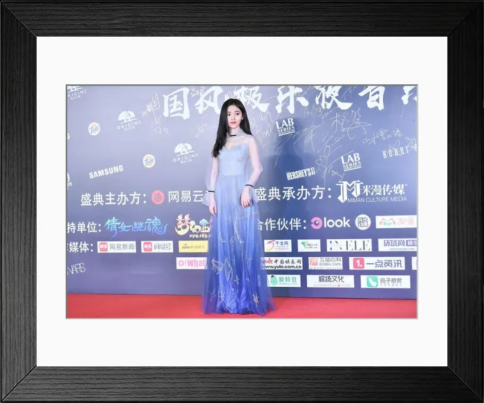 Framed Print : Chinese singer and actress Ju Jingyi poses as she arrives on the red carpet for the 2018 NetEase Cloud Music night in Framed Print : Chinese singer and actress Ju Jingyi poses as she arrives on the red carpet for the 2018 NetEase Cloud Music night in