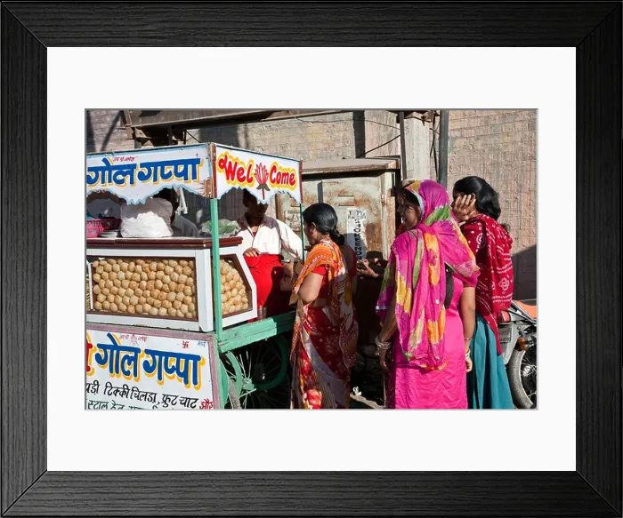 Framed Print : Indian women buying pani puri (indian snack). Bikaner. Rajasthan. India Framed Print : Indian women buying pani puri (indian snack). Bikaner. Rajasthan. India