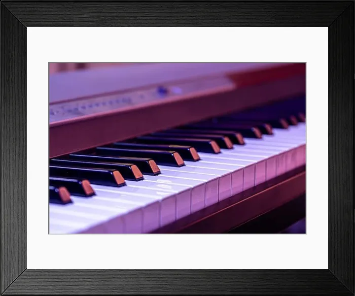 Framed Print : Piano keys on a beautiful colored background. Close up Framed Print : Piano keys on a beautiful colored background. Close up