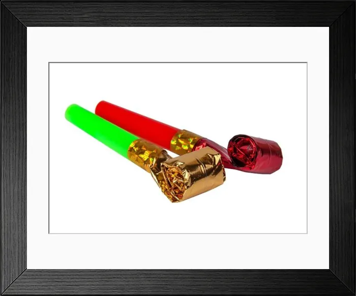 Framed Print : Party foil whistle or noise maker horn rolled isolated on the white Framed Print : Party foil whistle or noise maker horn rolled isolated on the white