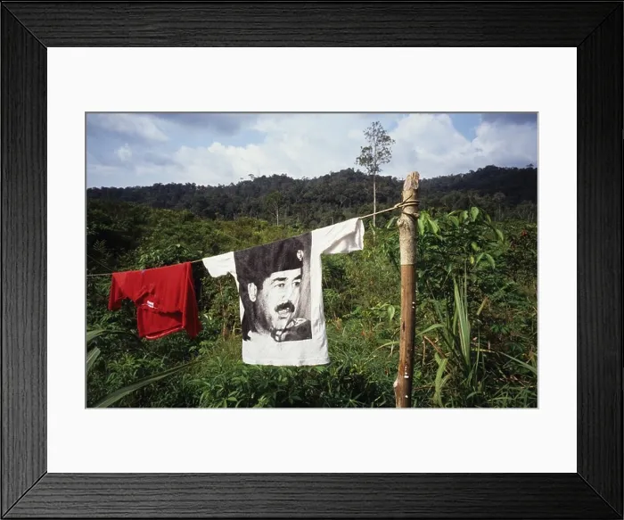 Framed Print : Saddam Hussein T-shirt hanging on washing line, Borneo Sarawak peoples Framed Print : Saddam Hussein T-shirt hanging on washing line, Borneo Sarawak peoples