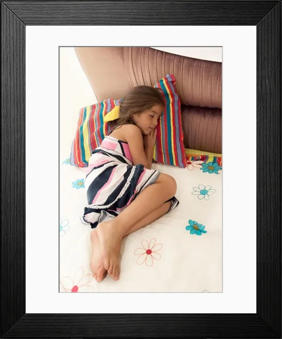 Framed Print : High angle of little girl sleeping