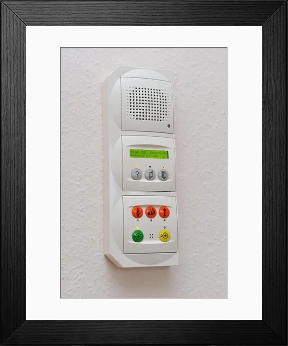 Framed Print : patient call button on the wall in a German hospital Framed Print : patient call button on the wall in a German hospital