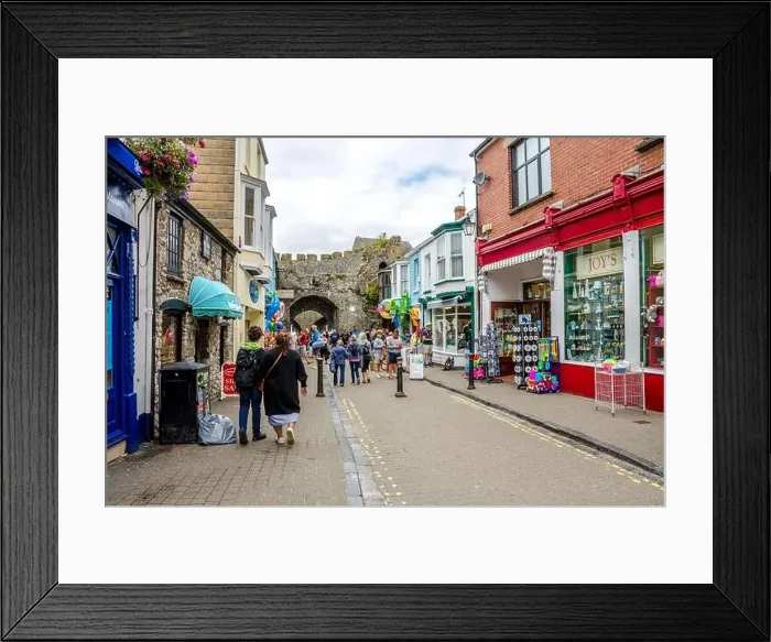 Framed Print : A view down St George Street in Tenby Framed Print : A view down St George Street in Tenby