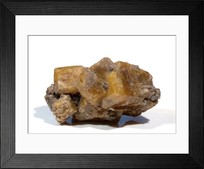 Framed Print : Mineral Vesuvianite, Four interlocking oblong crystals Amber-brown colour, Lake Jaco, Chihuahua, Mexico Framed Print : Mineral Vesuvianite, Four interlocking oblong crystals Amber-brown colour, Lake Jaco, Chihuahua, Mexico