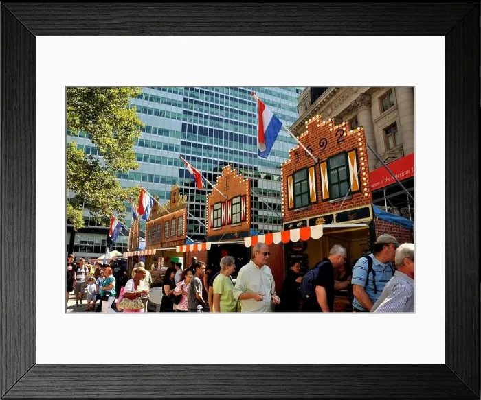 Framed Print : New York City: Visitors in front of gabled facades of 17th century Dutch buildings at the New Amsterdam Village Framed Print : New York City: Visitors in front of gabled facades of 17th century Dutch buildings at the New Amsterdam Village