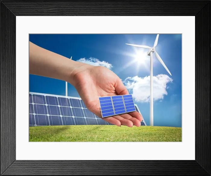 Framed Print : Digital composite of solar panel on hand in front of different devices to renewable energy Framed Print : Digital composite of solar panel on hand in front of different devices to renewable energy