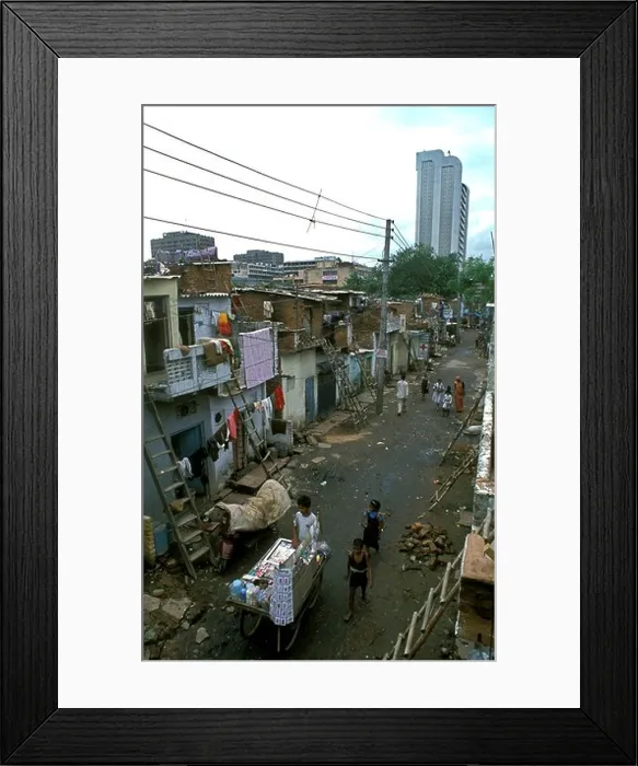 Framed Print : A contrast of urban life next to IFCI towers at Nehru Place New Framed Print : A contrast of urban life next to IFCI towers at Nehru Place New