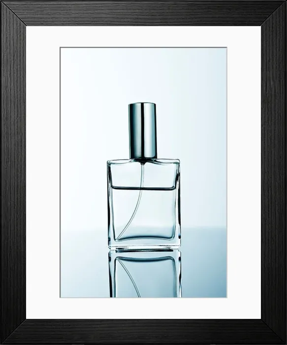 Framed Print : perfume bottle of clear perfume Framed Print : perfume bottle of clear perfume