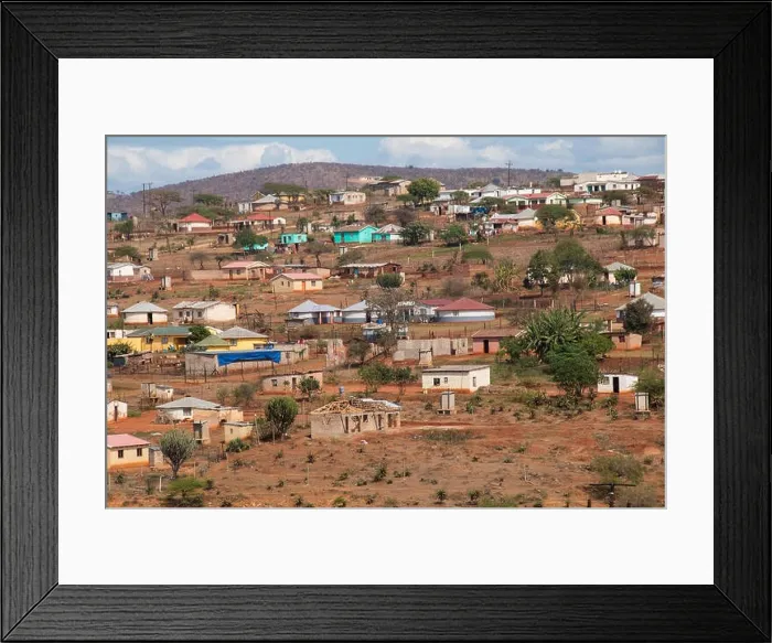 Framed Print : Housing and huts scattered informally on hill in rural south africa Framed Print : Housing and huts scattered informally on hill in rural south africa