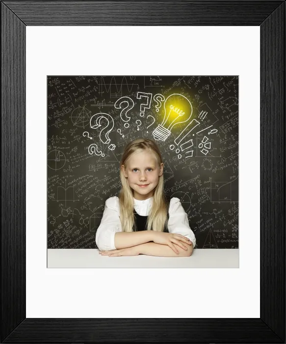 Framed Print : Idea! Smiling student girl with lightbulb on blackboard Framed Print : Idea! Smiling student girl with lightbulb on blackboard