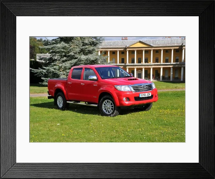 Framed Print : 2012 Toyota Hilux Invincible 4 wheel drive pick up truck driving off road Framed Print : 2012 Toyota Hilux Invincible 4 wheel drive pick up truck driving off road