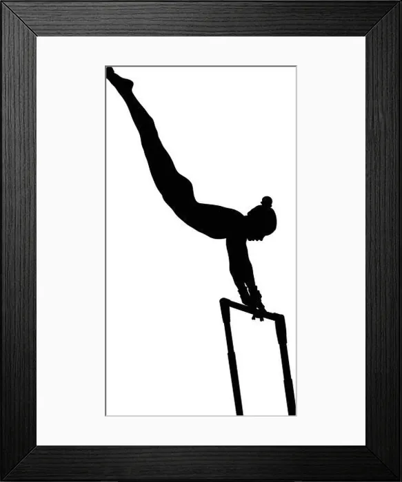Framed Print : uneven bars exercise woman gymnast in artistic gymnastics Framed Print : uneven bars exercise woman gymnast in artistic gymnastics
