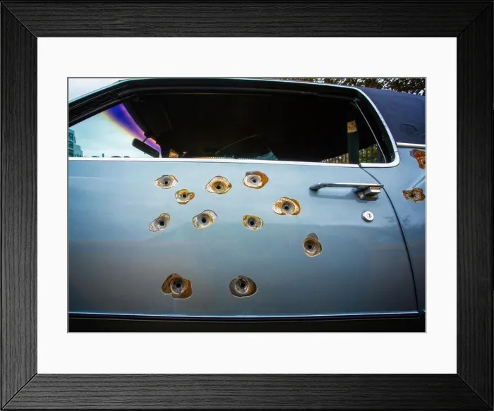 Framed Print : Bullet holes in a Cadillac Car Door Framed Print : Bullet holes in a Cadillac Car Door