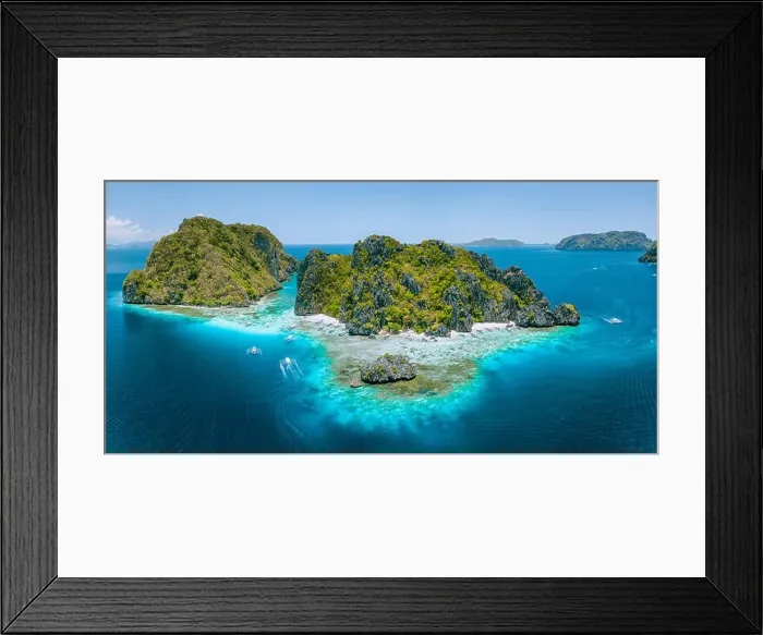 Framed Print : Aerial drone view of tropical Shimizu Island steep rocks and white sand beach in blue water El Nido Framed Print : Aerial drone view of tropical Shimizu Island steep rocks and white sand beach in blue water El Nido