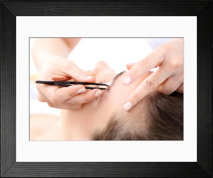 Framed Print : eyebrow tweezers. hair removal Framed Print : eyebrow tweezers. hair removal