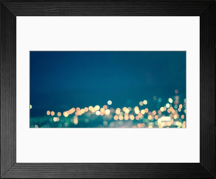 Framed Print : abstract blue circular natural bokeh background, city lights with horizon, art toning, panorama Framed Print : abstract blue circular natural bokeh background, city lights with horizon, art toning, panorama