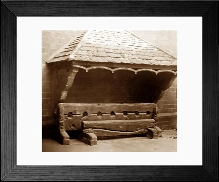 Framed Print : Village stocks at Winchcombe, early 1900s Framed Print : Village stocks at Winchcombe, early 1900s