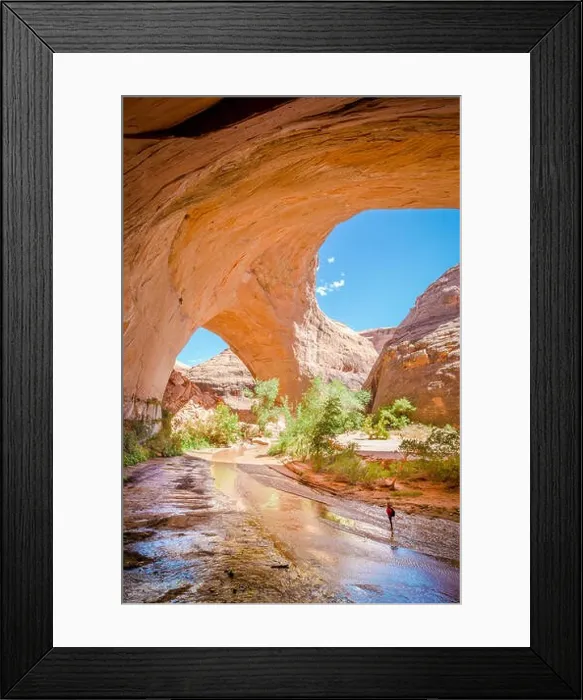 Framed Print : Wide angle view of a hiker backpacking beneath stunning Jacob Hamblin Arch in Coyote Gulch Framed Print : Wide angle view of a hiker backpacking beneath stunning Jacob Hamblin Arch in Coyote Gulch
