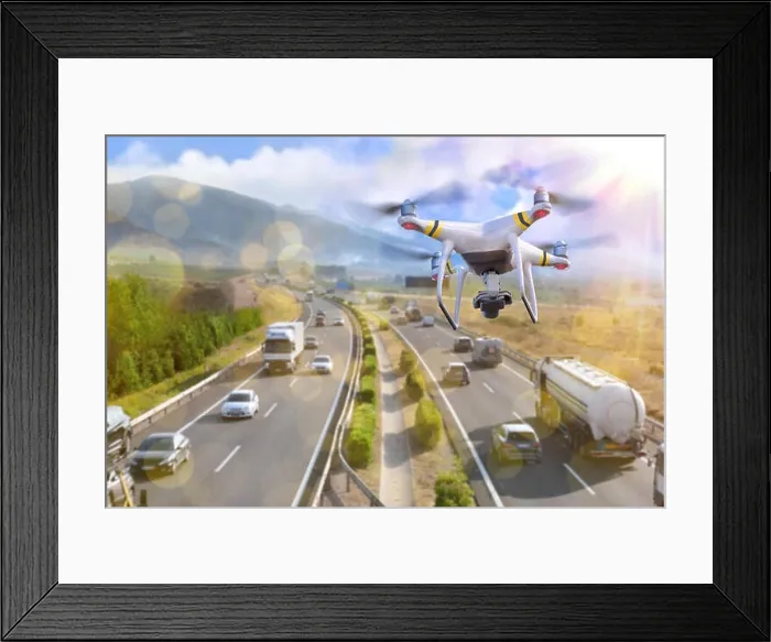 Framed Print : Concept of use of drones for the surveillance and control of traffic on highways Framed Print : Concept of use of drones for the surveillance and control of traffic on highways