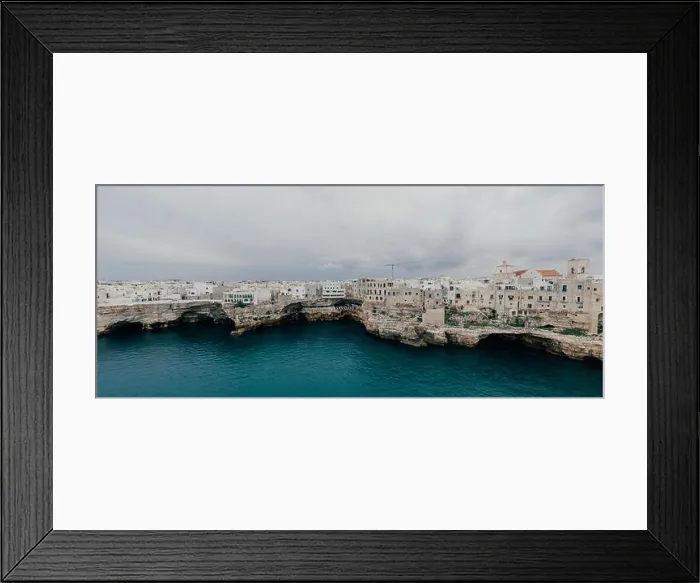 Framed Print : Polignano a Mare Apulia City Sea Coastline and white houses in Italy Drone 360 vr Framed Print : Polignano a Mare Apulia City Sea Coastline and white houses in Italy Drone 360 vr
