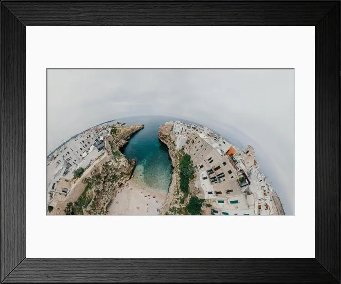 Framed Print : Old white city near blue the Sea Polignano Apulia Coastline blue in Italy Drone 360 vr Framed Print : Old white city near blue the Sea Polignano Apulia Coastline blue in Italy Drone 360 vr