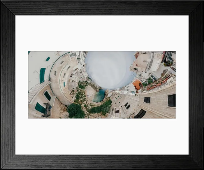 Framed Print : Old white city near blue the Sea Polignano Apulia Coastline blue in Italy Drone 360 vr Framed Print : Old white city near blue the Sea Polignano Apulia Coastline blue in Italy Drone 360 vr