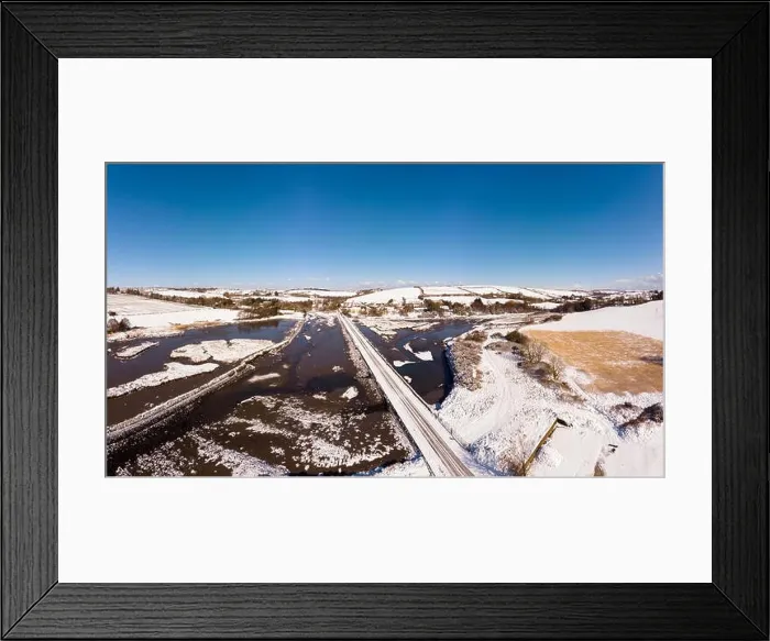 Framed Print : Aerial view of snowy landscape and river Framed Print : Aerial view of snowy landscape and river