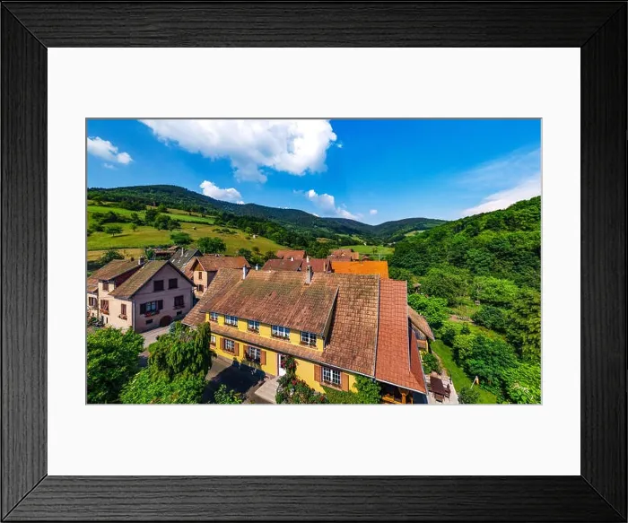 Framed Print : Old but renovated village house in countryside aerial view, Alsace, France Framed Print : Old but renovated village house in countryside aerial view, Alsace, France