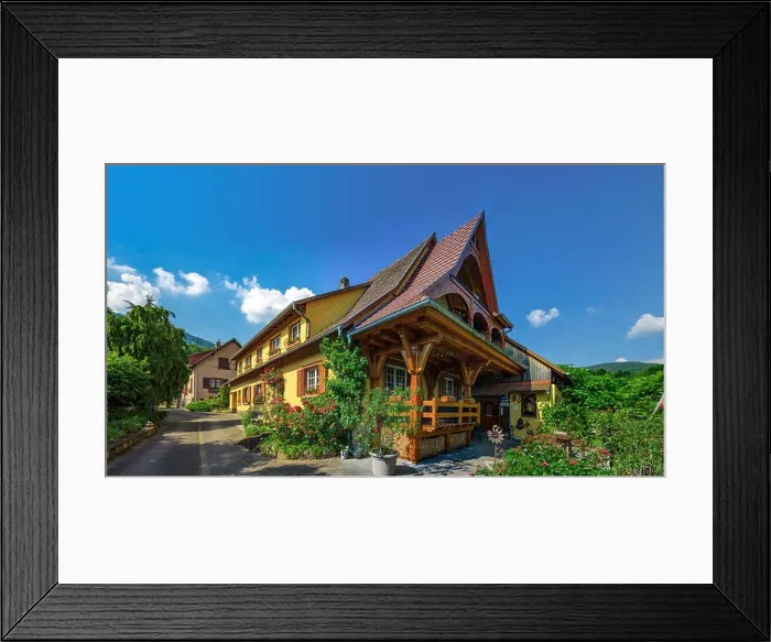 Framed Print : Old but renovated village house in countryside aerial view, Alsace, France Framed Print : Old but renovated village house in countryside aerial view, Alsace, France