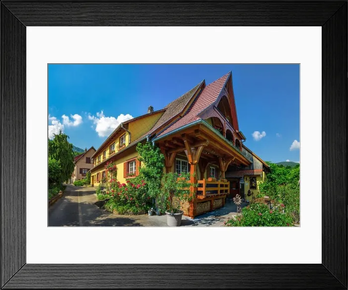 Framed Print : Old but renovated village house in countryside aerial view, Alsace, France Framed Print : Old but renovated village house in countryside aerial view, Alsace, France