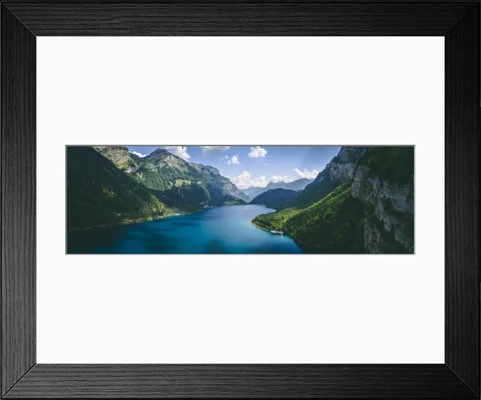 Framed Print : wide panorama aerial view of deep blue mountain lake and tree in swiss alps, klontalersee switzerland Framed Print : wide panorama aerial view of deep blue mountain lake and tree in swiss alps, klontalersee switzerland
