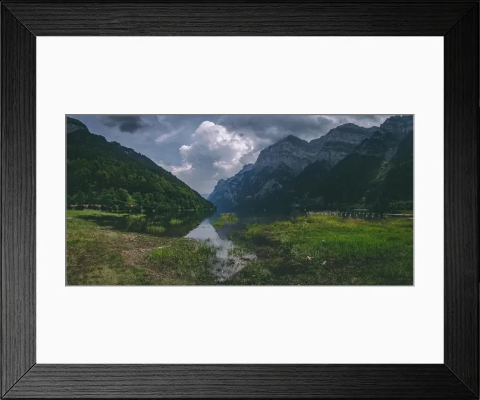 Framed Print : panorama of beautiful mountain lake in the swiss alps covered in dramatic clouds, klontalersee switzerland