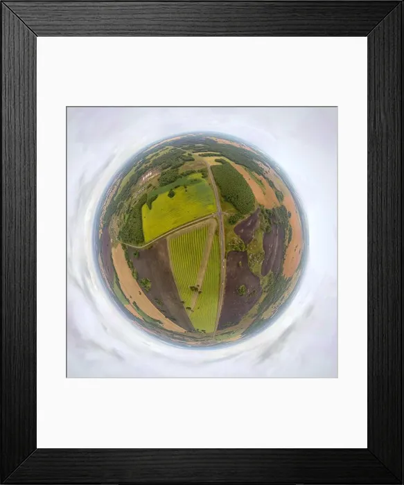 Framed Print : Helicopter drone shot. Aerial photography of a green field, roan and forest. Panoramic city 360 shot from above Framed Print : Helicopter drone shot. Aerial photography of a green field, roan and forest. Panoramic city 360 shot from above
