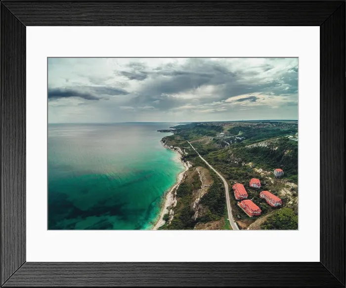 Framed Print : Panoramic view over golf fields next to the sea cliffs, aerial drone view Framed Print : Panoramic view over golf fields next to the sea cliffs, aerial drone view