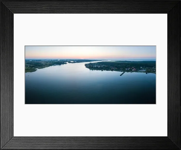 Framed Print : Beautiful sunset over estuary of Vistula river in Gdansk. Summer sunset over sea and river and small village Framed Print : Beautiful sunset over estuary of Vistula river in Gdansk. Summer sunset over sea and river and small village