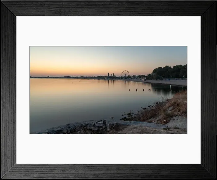 Framed Print : Beautiful view on town off the coast. Sunrise Framed Print : Beautiful view on town off the coast. Sunrise