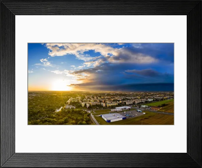 Framed Print : View from above on real estates in Ostrow Wielkopolski in Poland, during dynamic weather Framed Print : View from above on real estates in Ostrow Wielkopolski in Poland, during dynamic weather