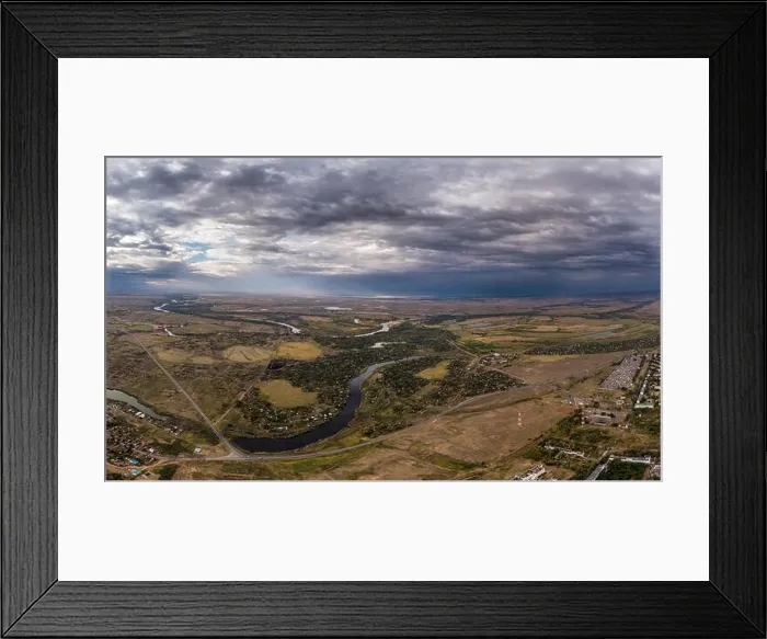 Framed Print : Aerial view on flowing river and town. Akhtuba River and Volga River Framed Print : Aerial view on flowing river and town. Akhtuba River and Volga River