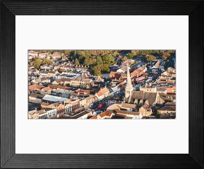 Framed Print : St ives, Cambridgeshire, with the yearly October fair being hosted down the high street Framed Print : St ives, Cambridgeshire, with the yearly October fair being hosted down the high street