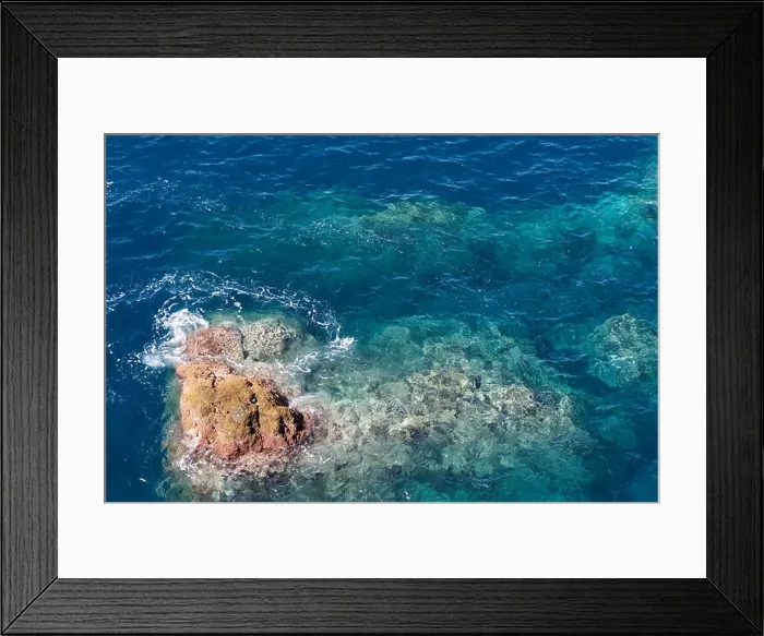 Framed Print : Rock in the clear water of Atlantic ocean. Madeira island, portugal Framed Print : Rock in the clear water of Atlantic ocean. Madeira island, portugal