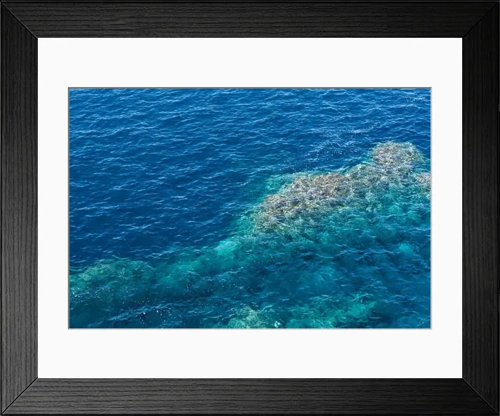Framed Print : Rock in the clear water of Atlantic ocean. Madeira island, portugal Framed Print : Rock in the clear water of Atlantic ocean. Madeira island, portugal